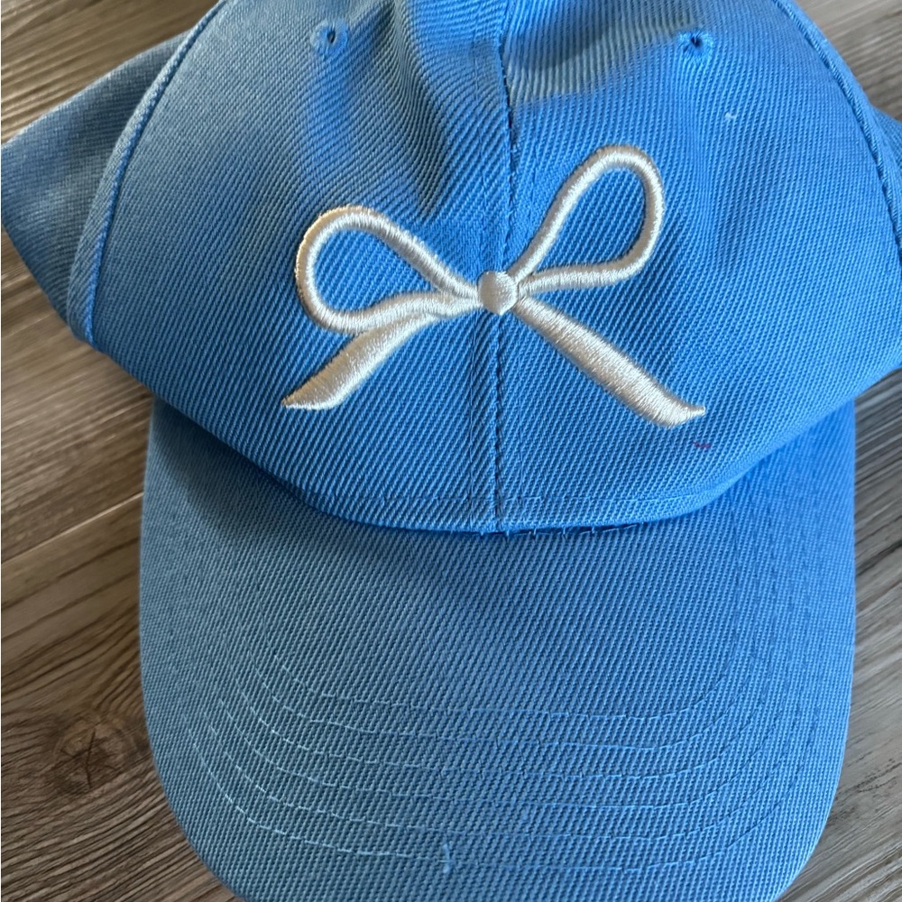 Blue women’s Cap with White Bow Embroidery